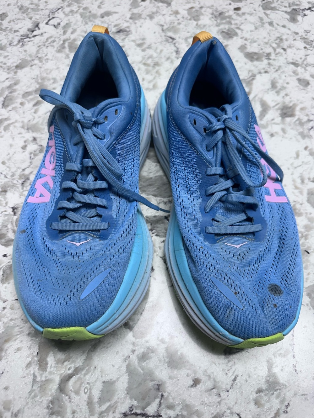 Hoka Women's Light Blue Running Shoes with Pink Logo and Lime Accents